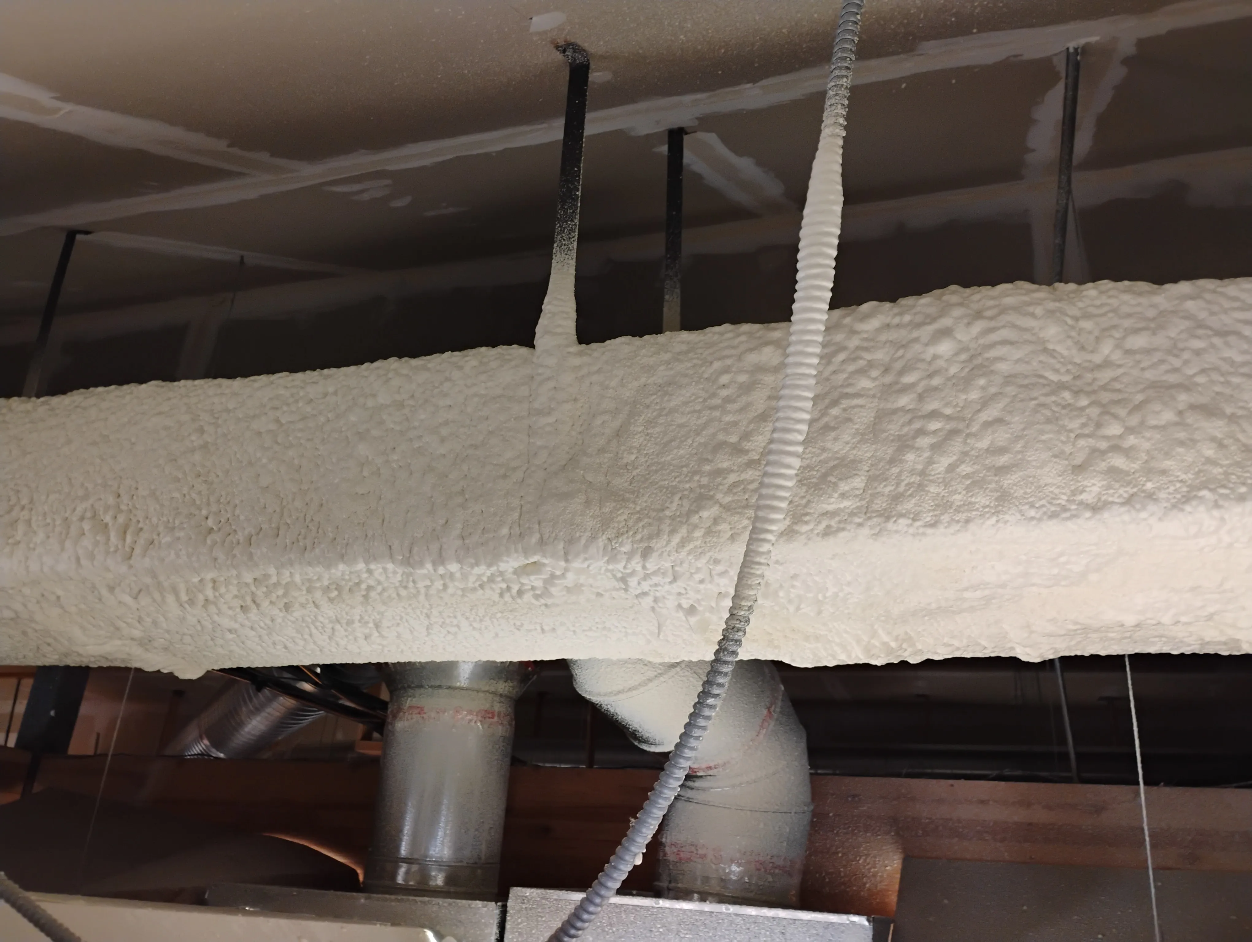 Foam insulation in a larger building assembly