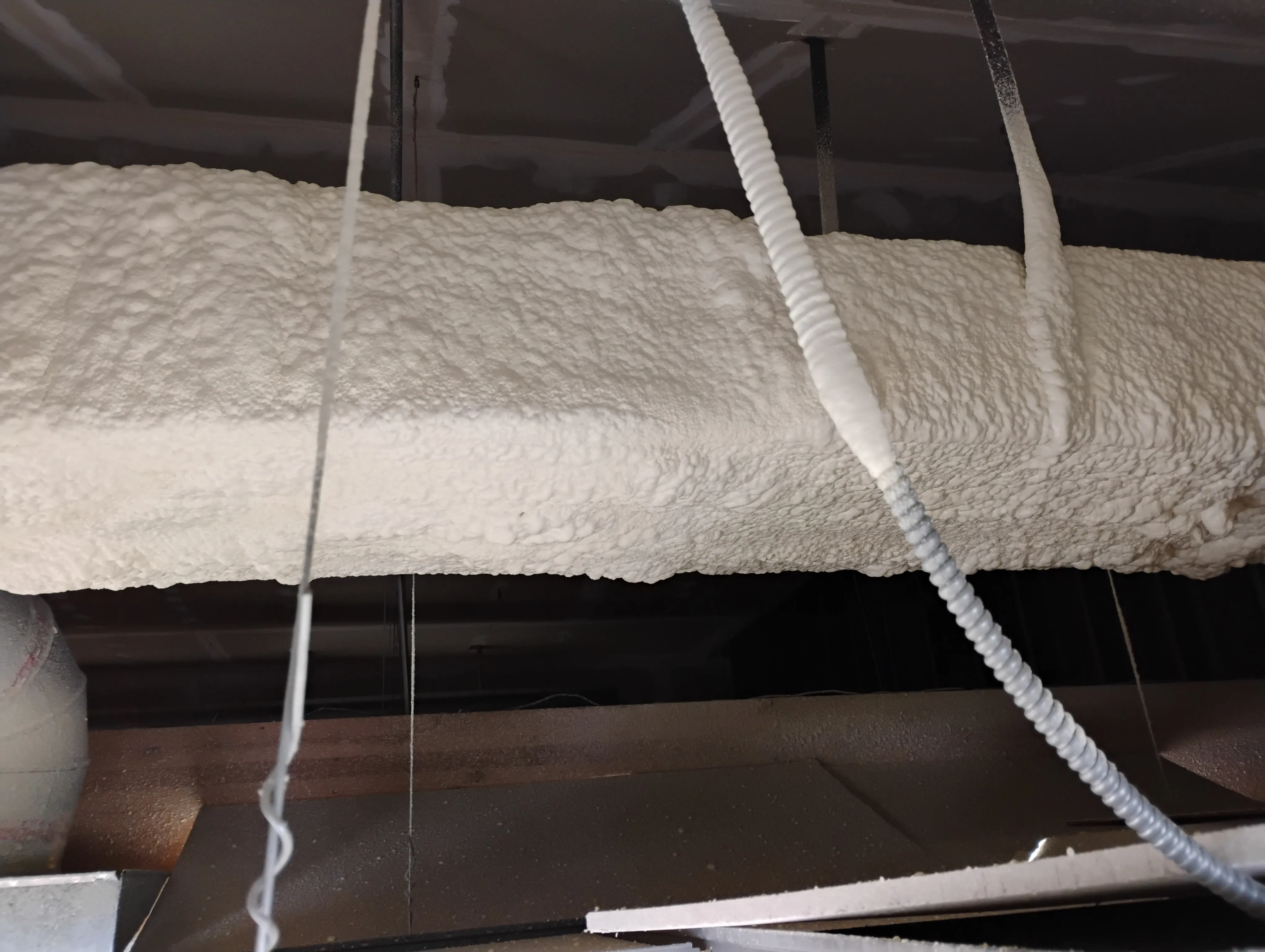 Finished spray foam insulation application